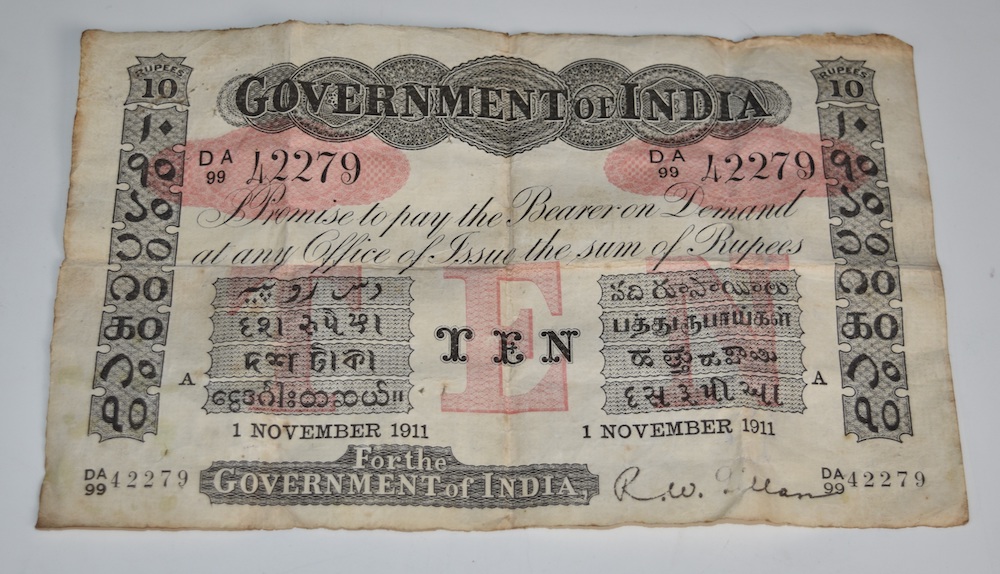 Government Of India 10 Rupees, Letter 'A' For Cawnpore, 1 November 1911, Serial Number AD99 42279, Signature R. W. Gillan, Black On Red Underprint. Sold For Ś2,800