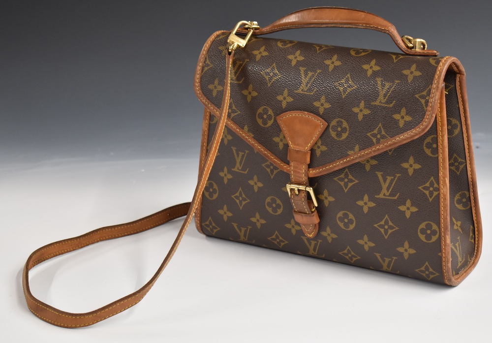 At Auction: Vintage Louis Vuitton Handbag, 9h x 12w (fair-good condition)